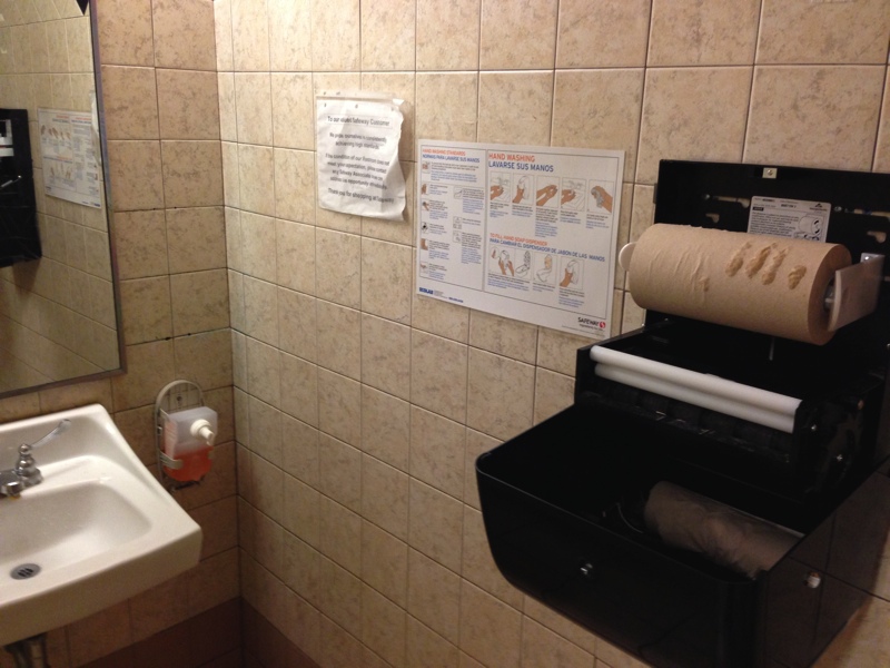 Note the soap dispenser and the paper towel dispenser are in ill repair